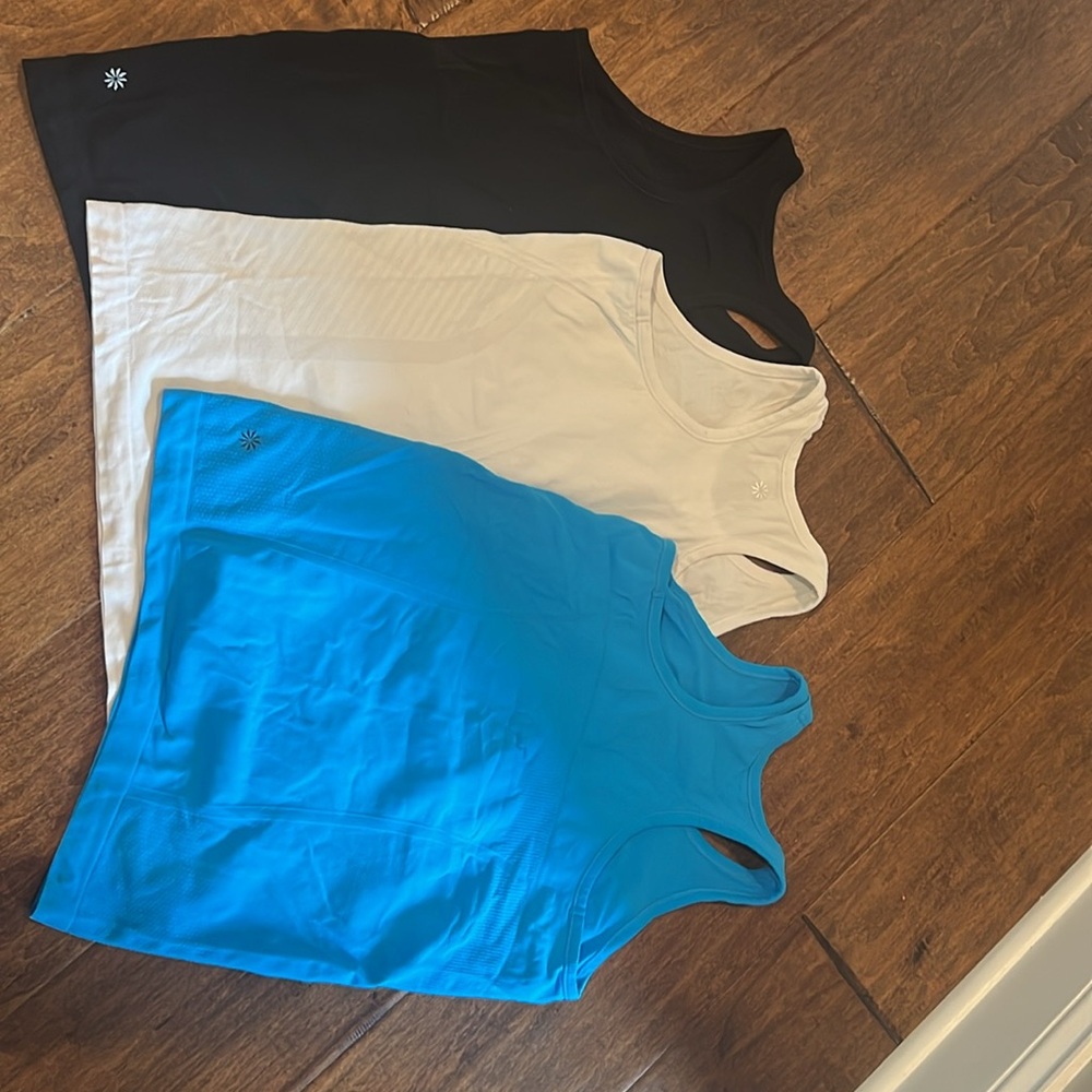 3 Athleta Girl 10-12 Limitless seamless tank tops, mint condition like brand new